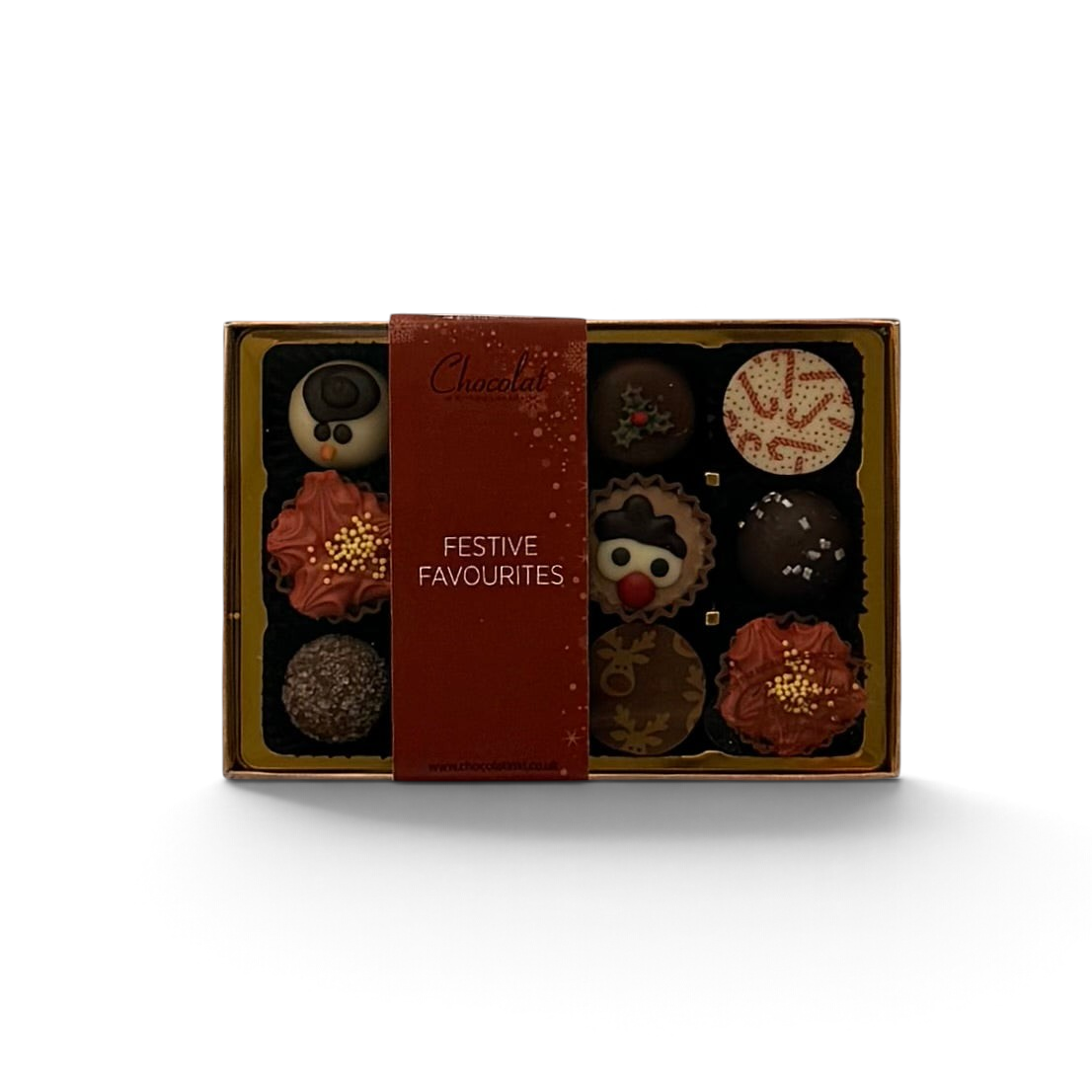 Chocolat in Kirkby Lonsdale Festive Favourites gift box featuring 12 assorted Christmas-themed chocolates.