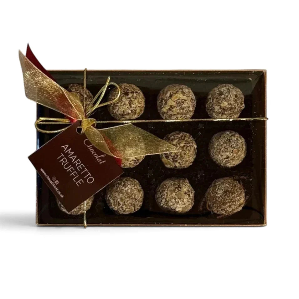 Chocolat in Kirkby Lonsdale gift box of 12 almond-flavoured Amaretto truffles with gold ribbon and branded tag