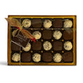 Chocolat in Kirkby Lonsdale gift box of 24 Baileys and espresso chocolates with gold ribbon and branded tag