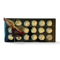 Chocolat in Kirkby Lonsdale gift box of 18 white chocolate Baileys truffles with a gold ribbon and branded tag