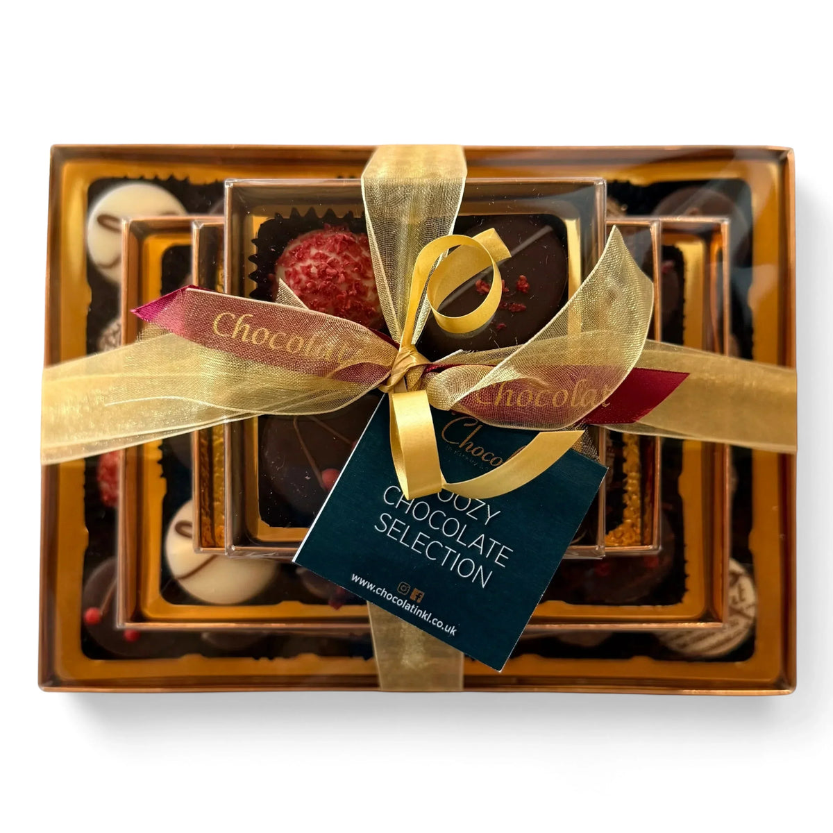 Chocolat in Kirkby Lonsdale luxury stack of 46 boozy chocolate truffles wrapped with a gold ribbon and gift tag