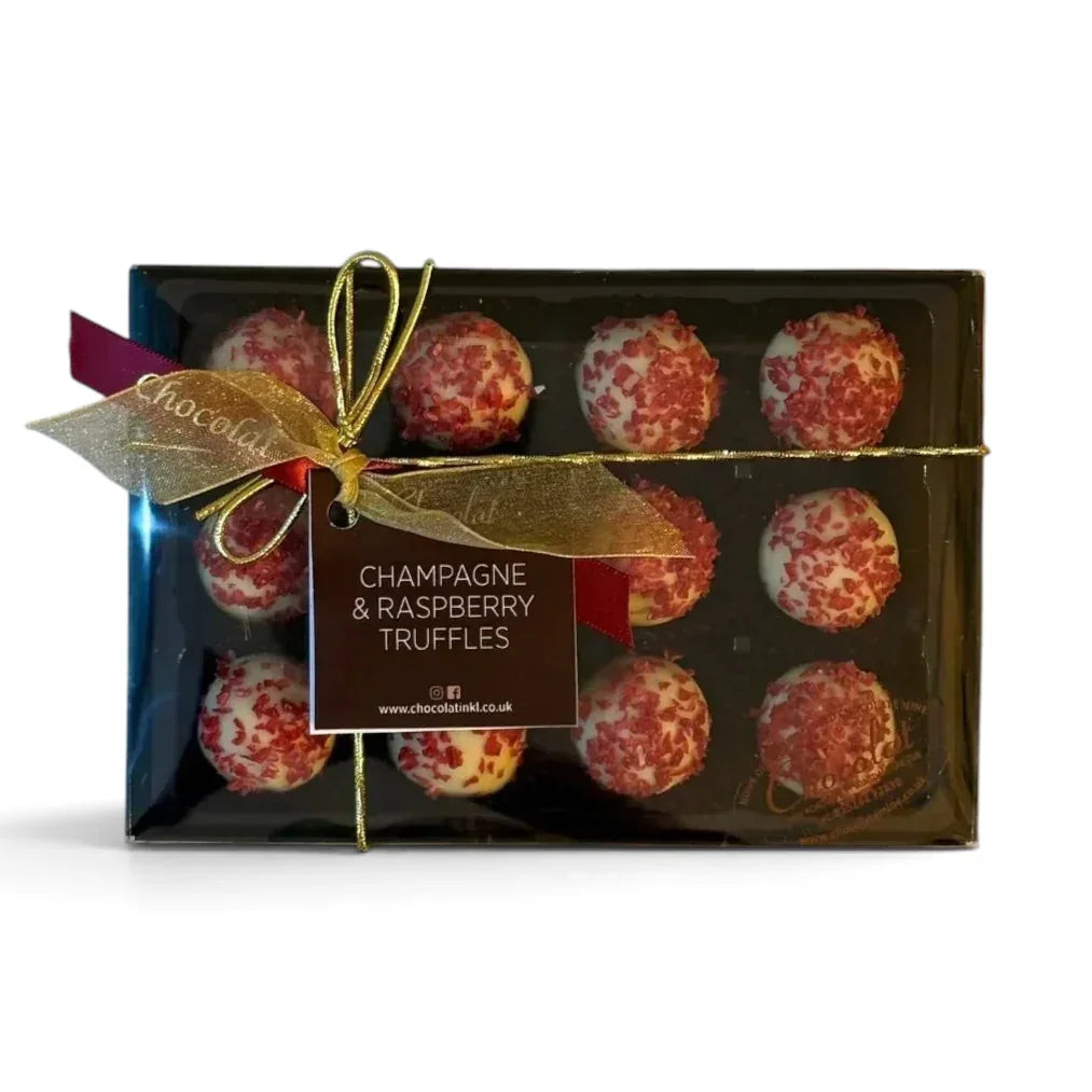 Chocolat in Kirkby Lonsdale gift box of 12 white chocolate champagne and raspberry truffles with gold ribbon