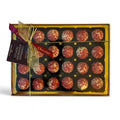 Chocolat in Kirkby Lonsdale gift box of 24 white chocolate champagne and raspberry truffles with red sprinkles