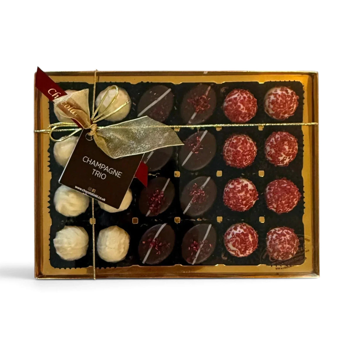 Chocolat in Kirkby Lonsdale Champagne Trio gift box featuring 24 assorted dark, white, and raspberry champagne truffles.