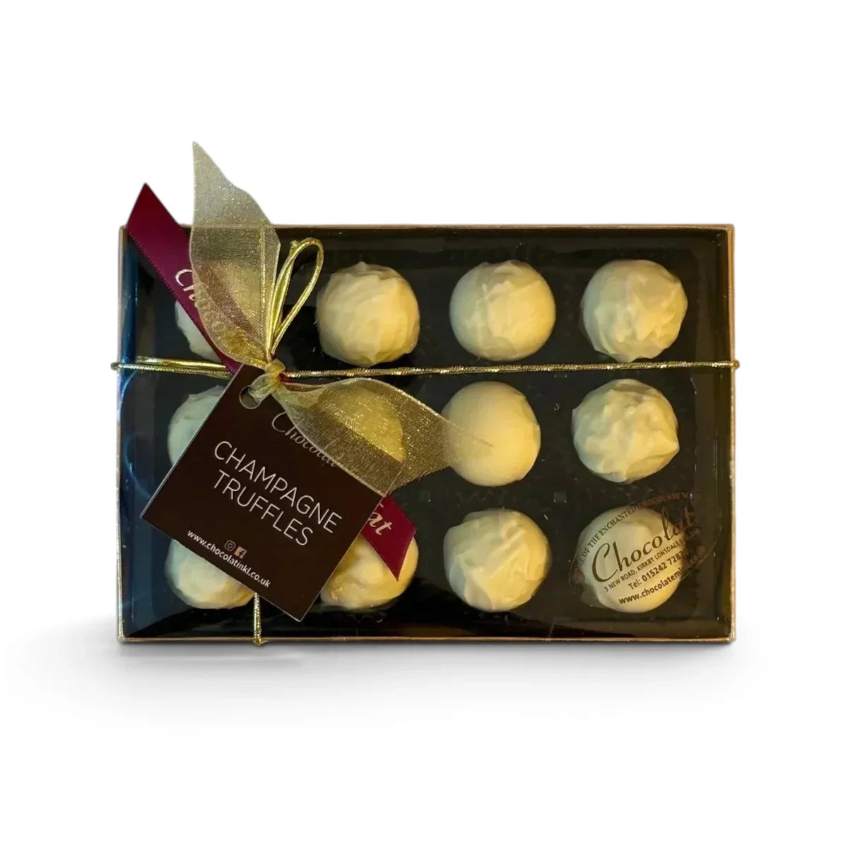 Chocolat in Kirkby Lonsdale gift box of 12 white chocolate champagne truffles with a gold ribbon and branded tag