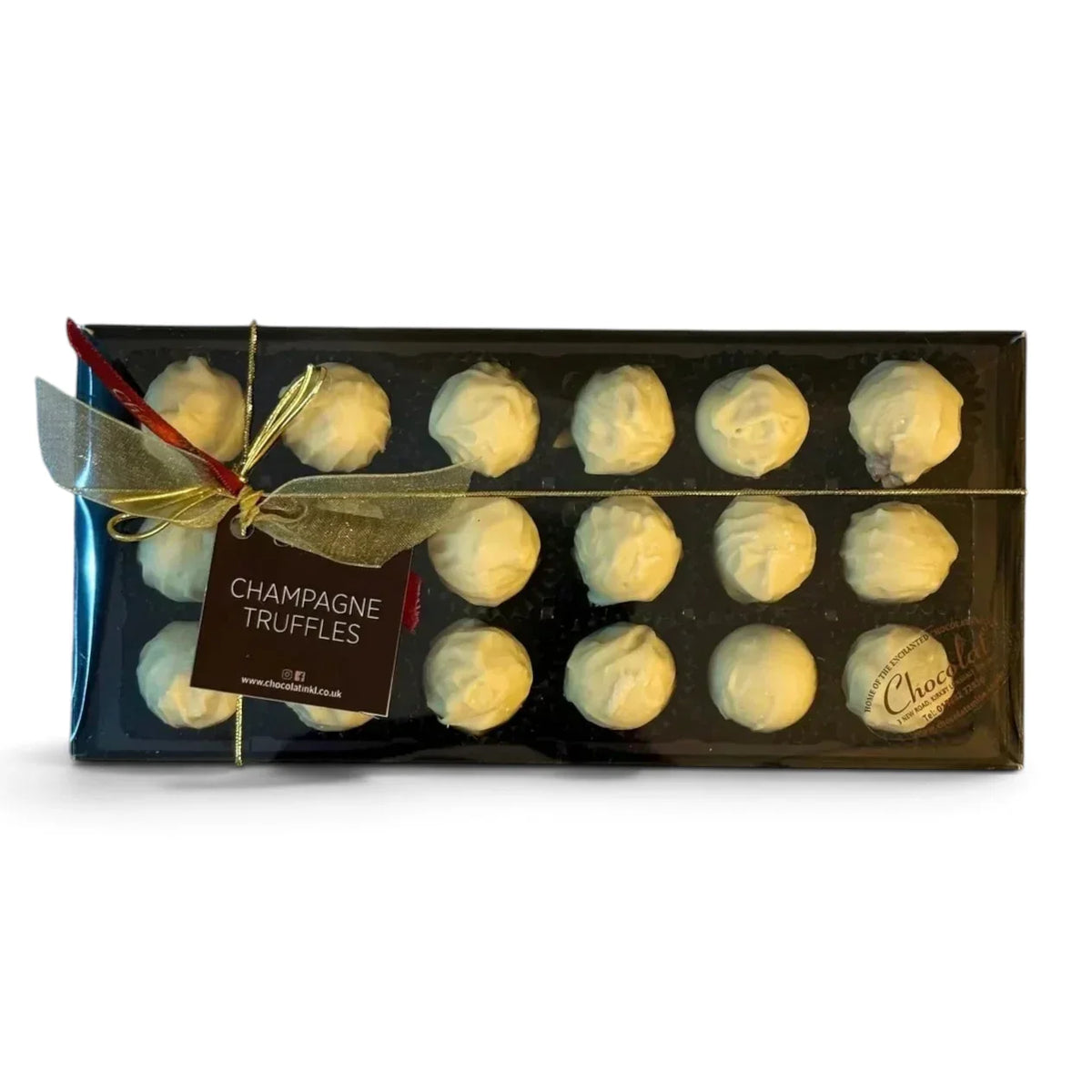 Chocolat in Kirkby Lonsdale gift box of 18 white chocolate champagne truffles with a gold ribbon and gift tag