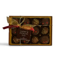 Chocolat in Kirkby Lonsdale gift box of 12 cherry and pistachio chocolates with a gold ribbon and branded tag