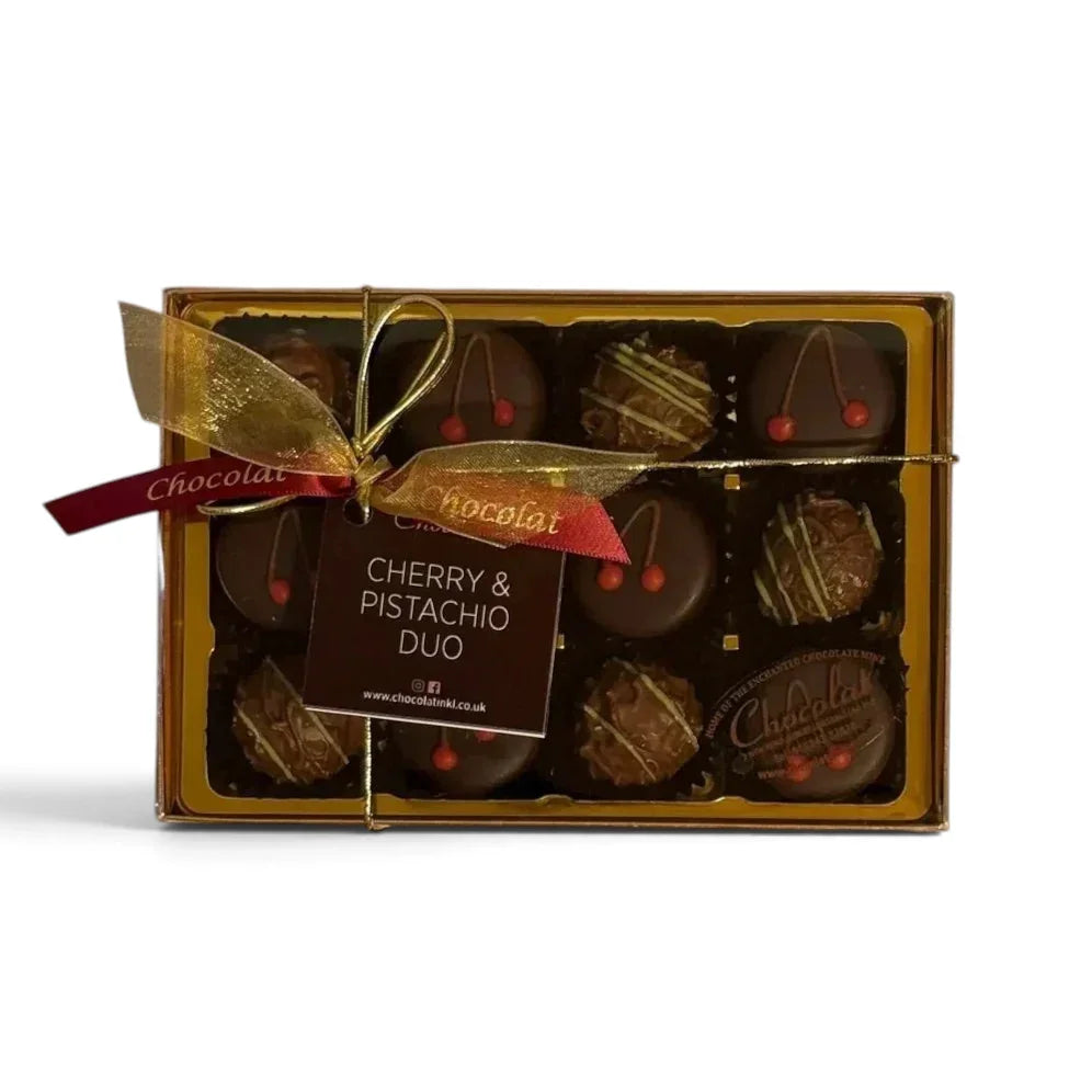 Chocolat in Kirkby Lonsdale gift box of 12 cherry and pistachio chocolates with a gold ribbon and branded tag