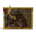 Chocolat in Kirkby Lonsdale gift box of 24 chocolate brownie squares with dark chocolate crumb topping and gold bow.
