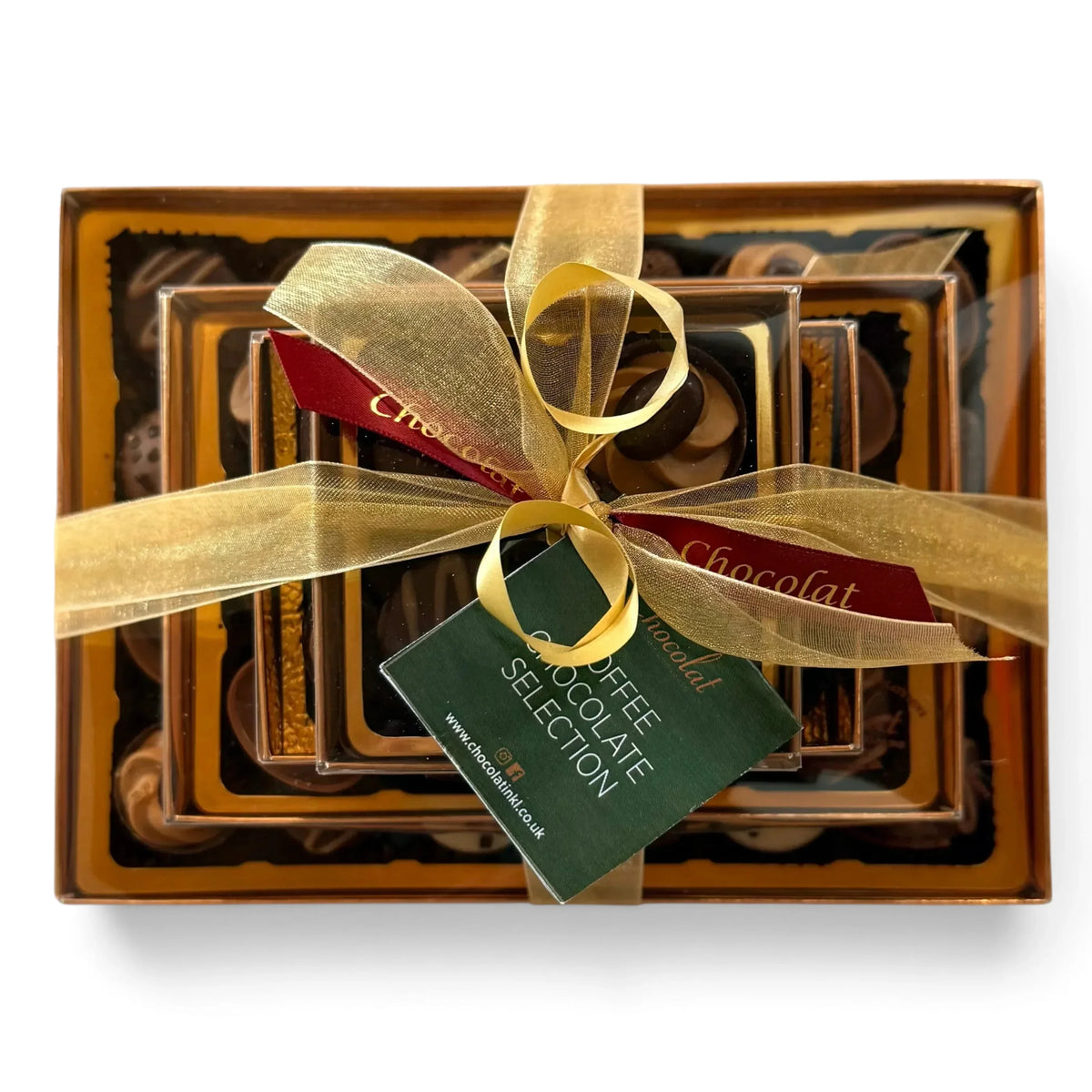 Chocolat in Kirkby Lonsdale luxury stack of 46 coffee-flavoured chocolates with a gold ribbon and gift tag.