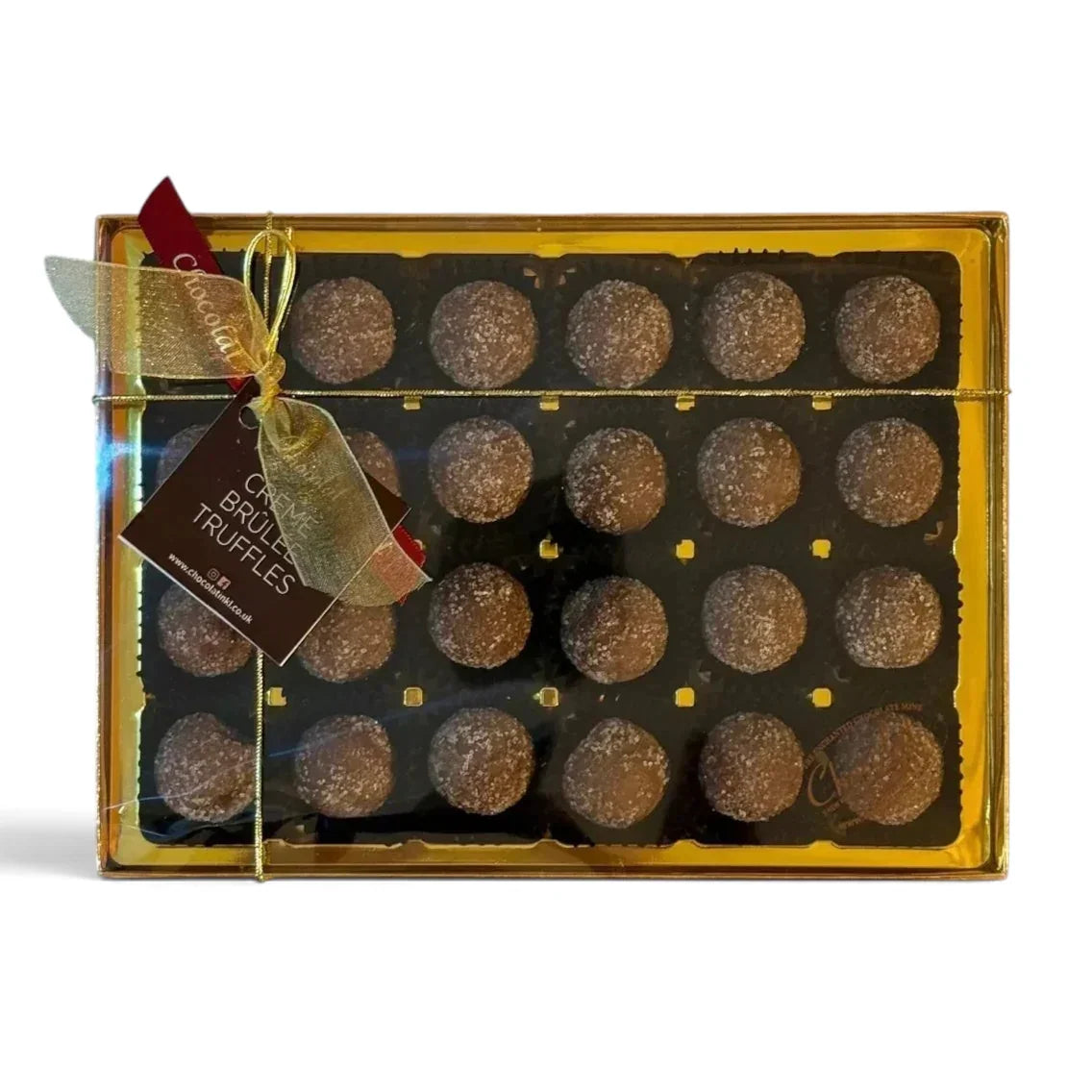 Chocolat in Kirkby Lonsdale gift box of 24 milk chocolate creme brulee truffles with sugar dusting and gold ribbon