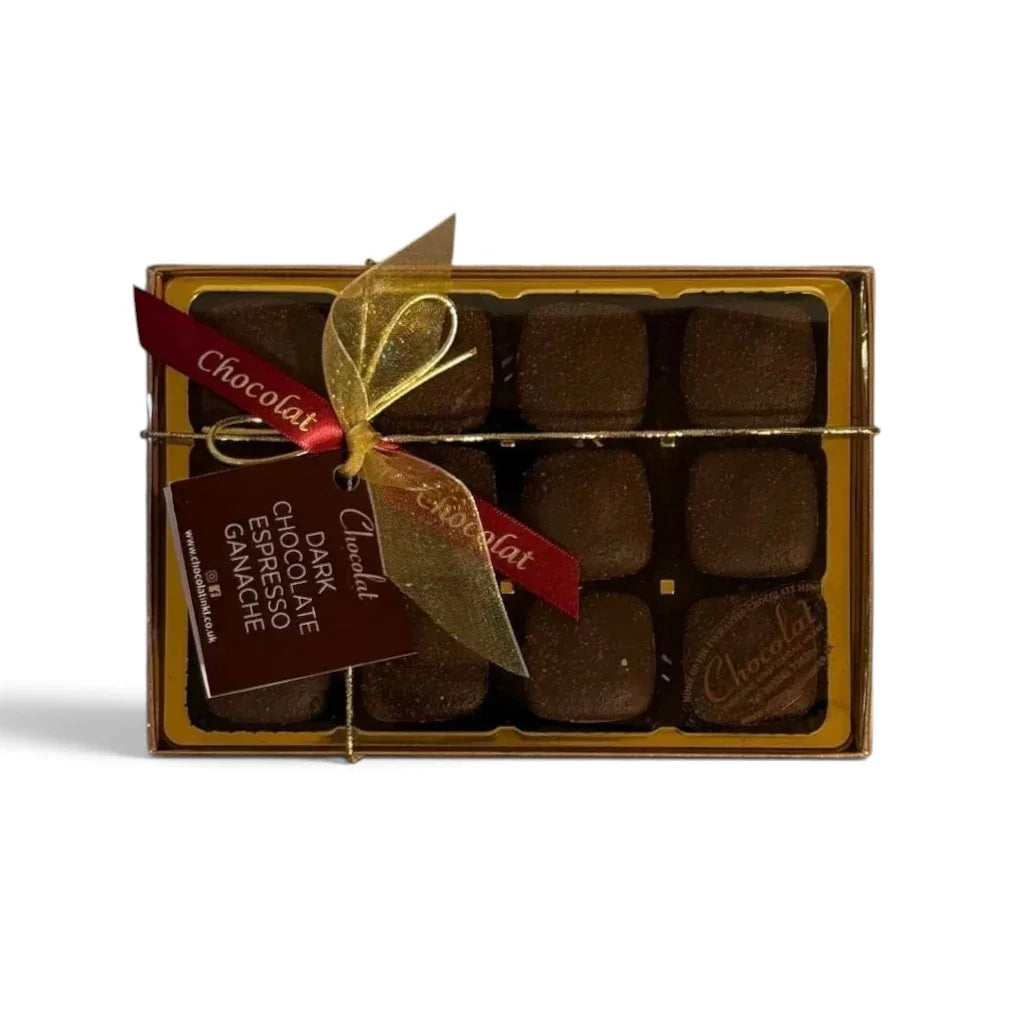 Chocolat in Kirkby Lonsdale gift box of 12 dark chocolate espresso ganache squares with a decorative gold ribbon.
