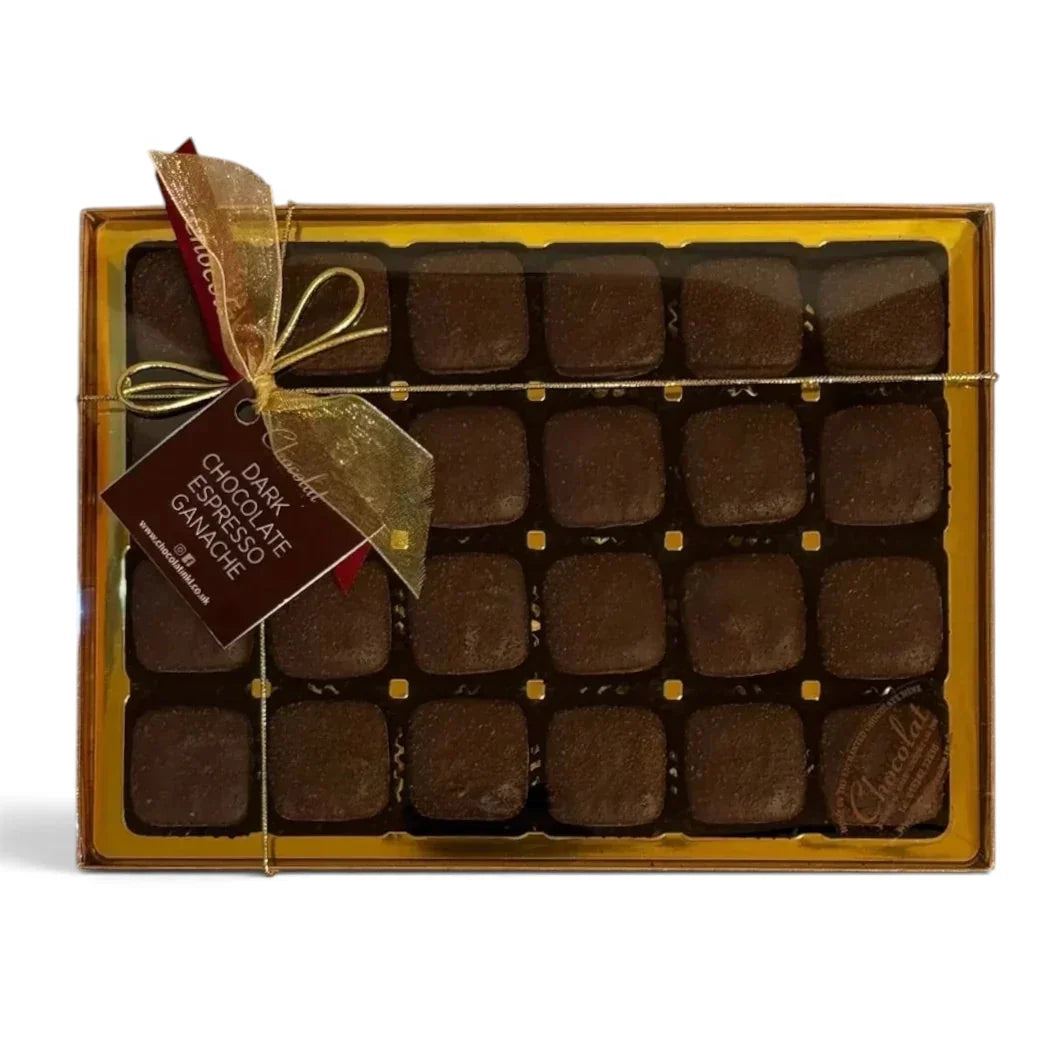 Chocolat in Kirkby Lonsdale gift box of 24 dark chocolate espresso ganache squares with a gold ribbon and tag.