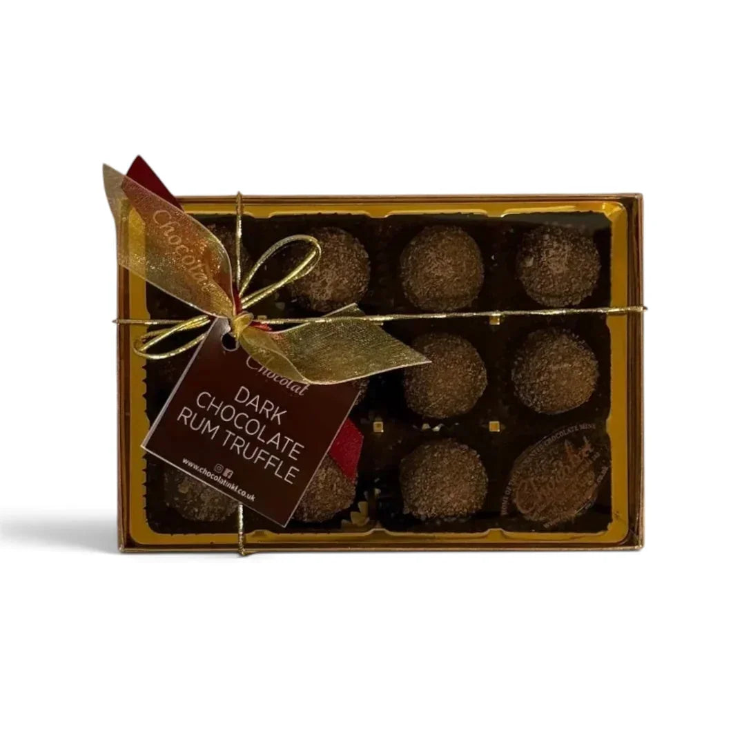 Chocolat in Kirkby Lonsdale gift box of 12 dark chocolate rum truffles with a gold ribbon and branded tag