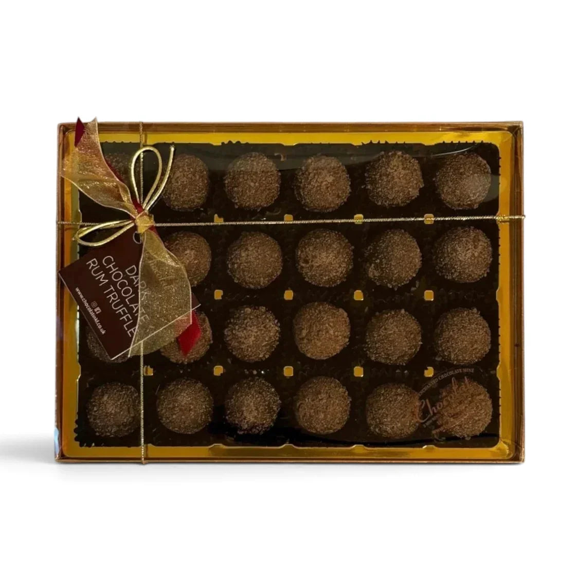 Chocolat in Kirkby Lonsdale gift box of 24 dark chocolate rum truffles with gold ribbon and festive tag