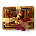 Chocolat in Kirkby Lonsdale luxury stack of 46 fruity chocolates wrapped in gold ribbon with a branded gift tag