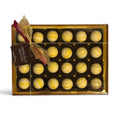 Chocolat in Kirkby Lonsdale gift box of 24 handcrafted white chocolate Limoncello truffles with yellow drizzle