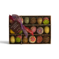 Chocolat in Kirkby Lonsdale small gift box featuring assorted fruit-shaped and chocolate-covered marzipan pralines.