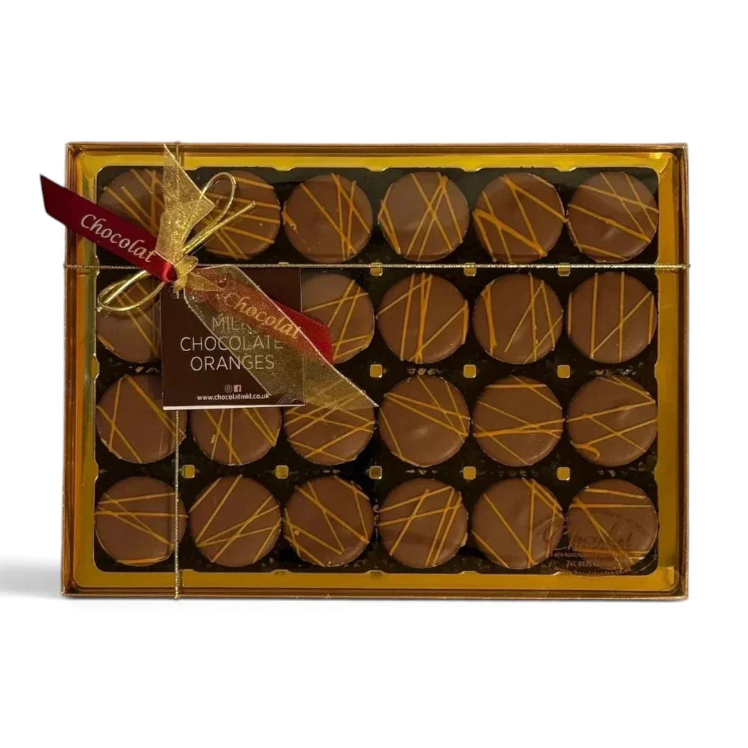 Chocolat in Kirkby Lonsdale gift box of 24 milk chocolate oranges with orange drizzle and decorative ribbon