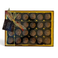 Chocolat in Kirkby Lonsdale gift box of 24 milk chocolate rum truffles with crumbly coating and gold ribbon tie