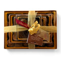 Chocolat in Kirkby Lonsdale luxury milk chocolate selection gift stack with gold ribbon and branded tag