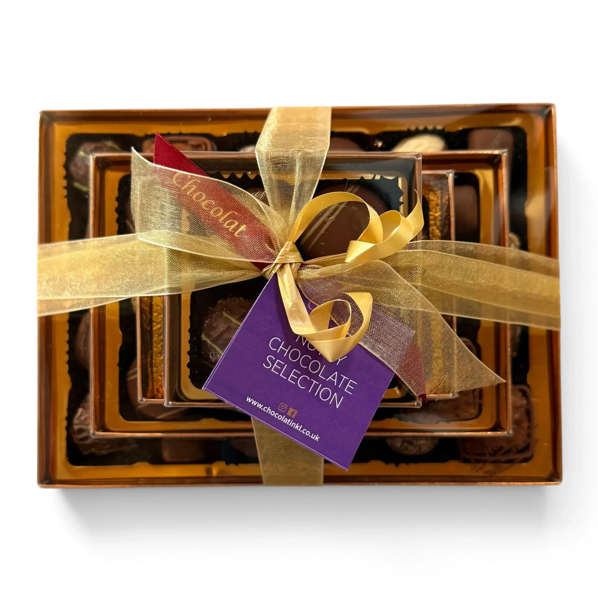 Chocolat in Kirkby Lonsdale luxury stack of 46 assorted nutty chocolates with gold ribbon and purple gift tag