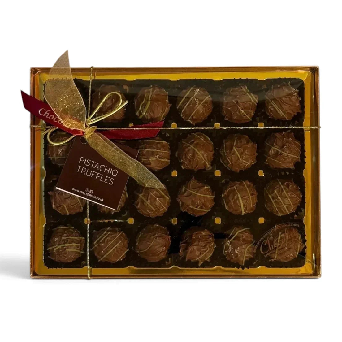 Chocolat in Kirkby Lonsdale gift box of 24 milk chocolate pistachio truffles with a decorative ribbon and tag.
