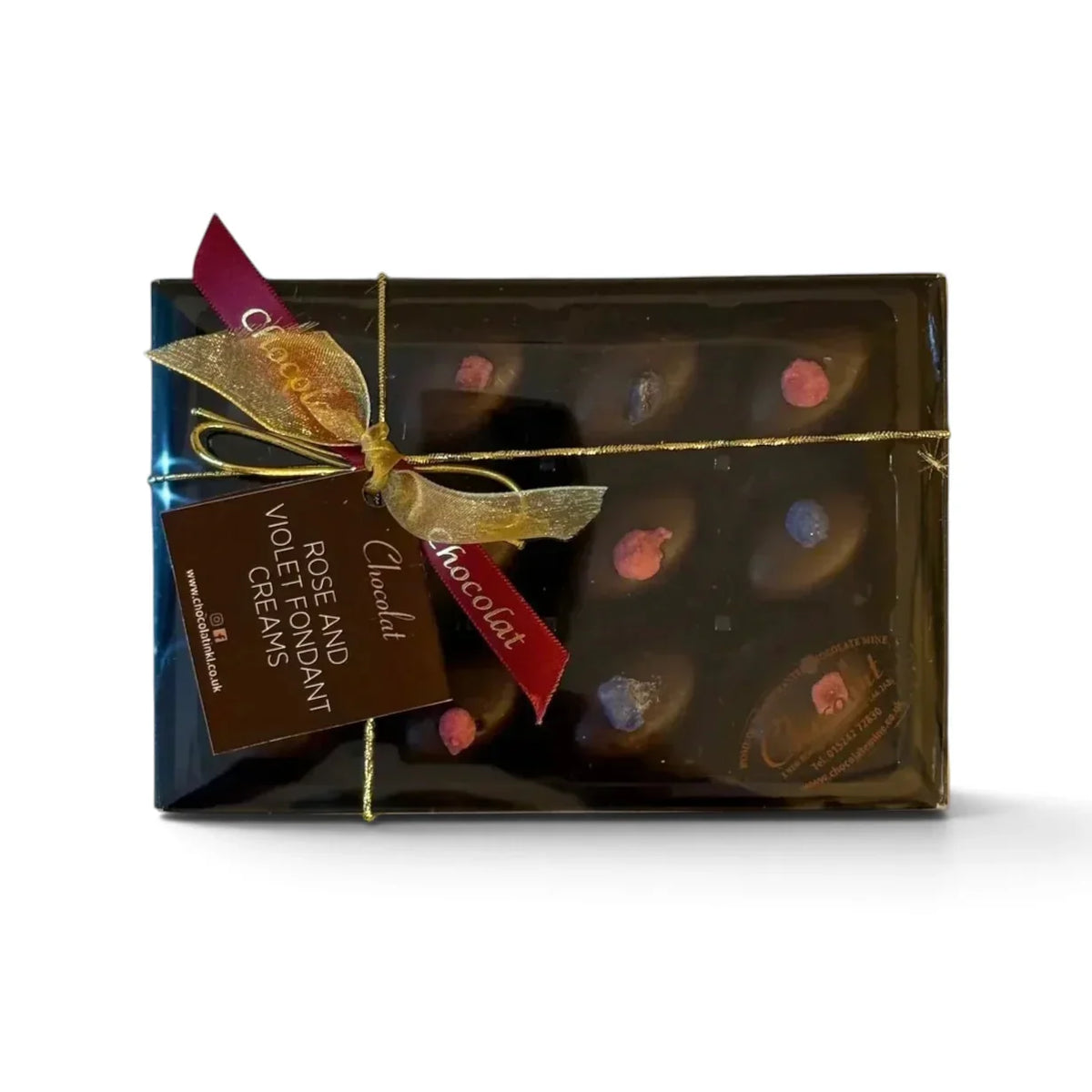 Chocolat in Kirkby Lonsdale gift box of 12 dark chocolate rose and violet fondant creams with a decorative ribbon