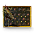 Chocolat in Kirkby Lonsdale gift box of 24 dark chocolate rose and violet fondant creams with floral decorations