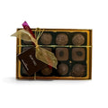 Chocolat in Kirkby Lonsdale Rum Trio gift box containing 12 assorted dark and milk chocolate rum truffles with ribbon