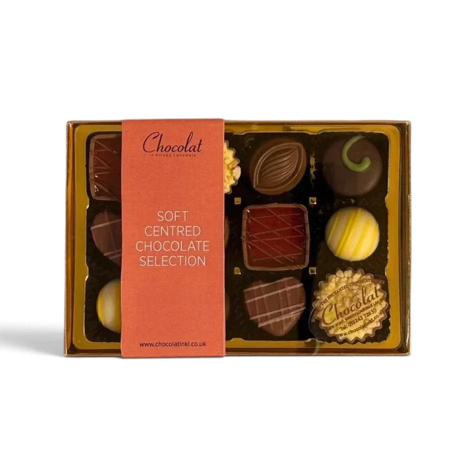 Chocolat in Kirkby Lonsdale gift box of 12 assorted soft-centred chocolates with various flavours and decorations.