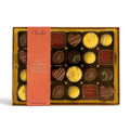 Chocolat in Kirkby Lonsdale gift box of 24 assorted soft-centred chocolates with various flavours and decorations.