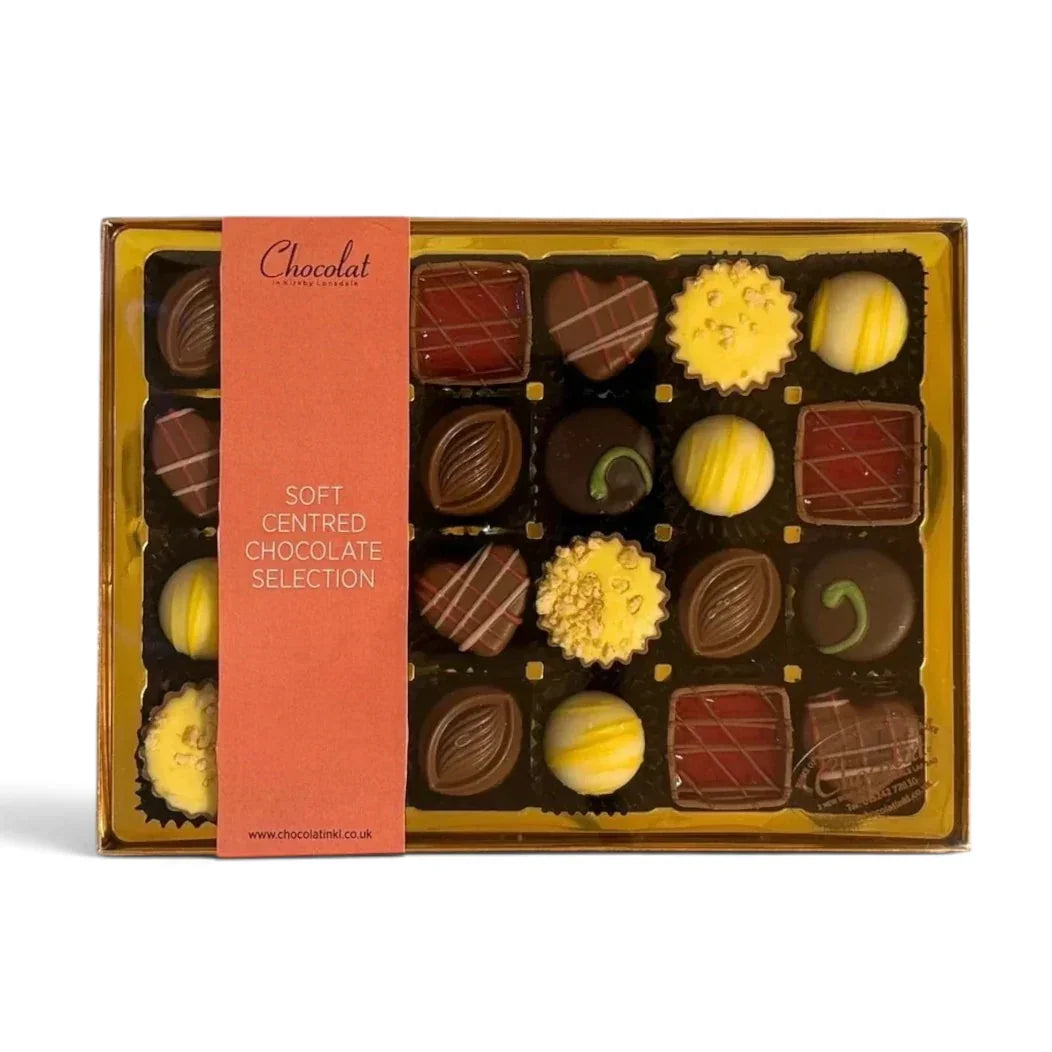 Chocolat in Kirkby Lonsdale gift box of 24 assorted soft-centred chocolates with various flavours and decorations.
