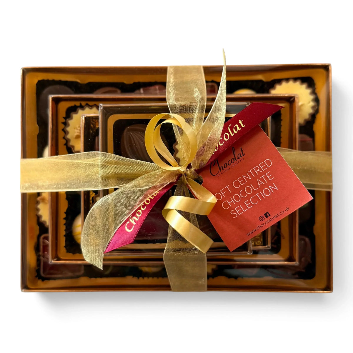 Chocolat in Kirkby Lonsdale luxury stack of 46 soft-centred chocolates with gold ribbon and branded gift tag