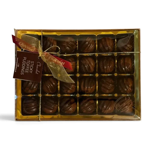 Chocolat in Kirkby Lonsdale gift box of 24 milk chocolate sticky toffee puddings with caramel and spiced centers