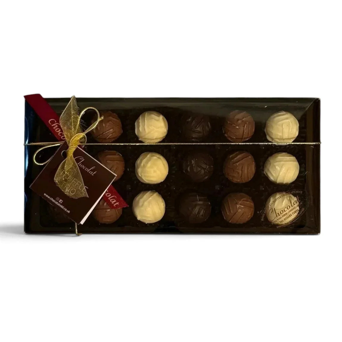 Chocolat in Kirkby Lonsdale gift box of 18 handcrafted milk, white, and dark chocolate truffles with gold ribbon.