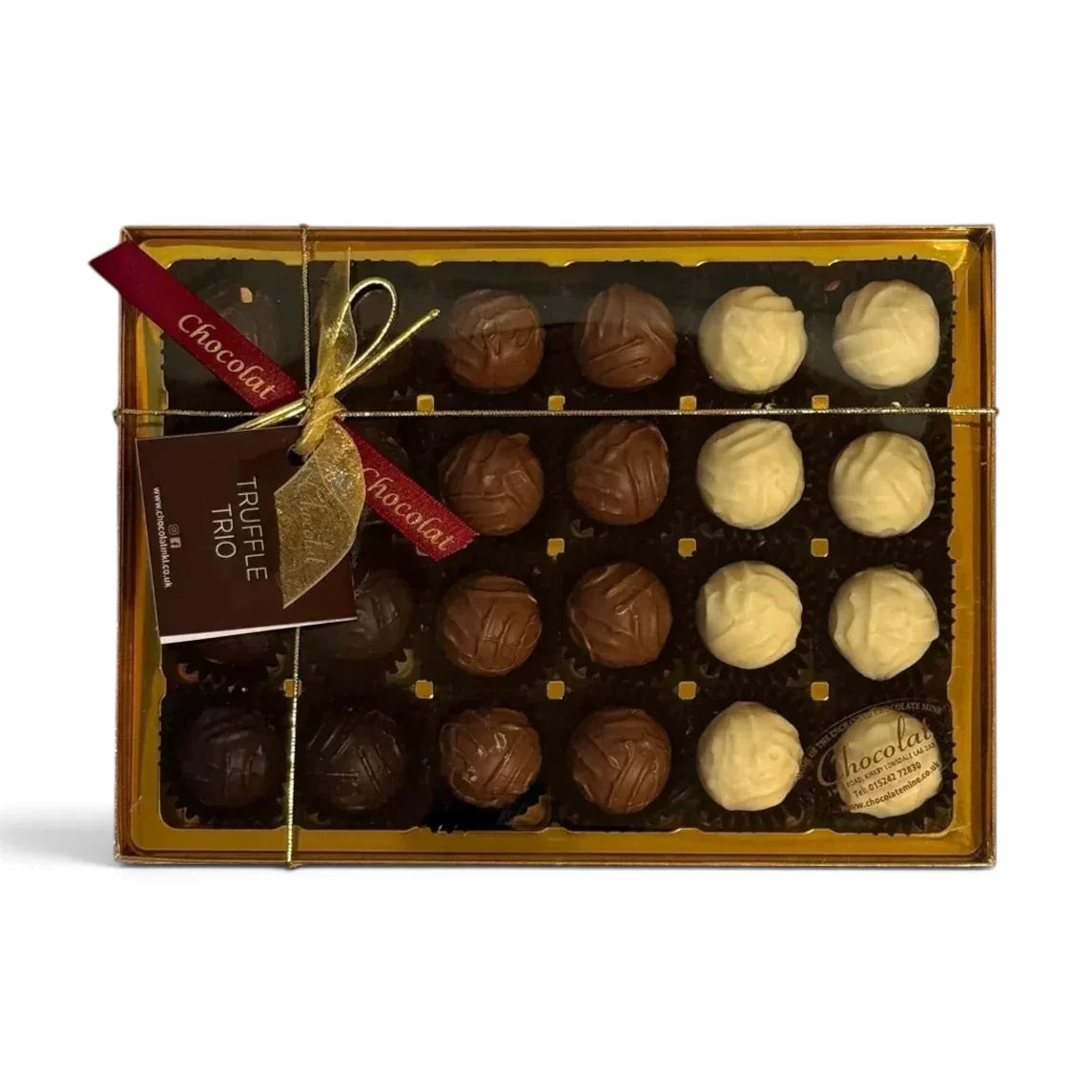 Chocolat in Kirkby Lonsdale gift box of 24 assorted milk, white, and dark chocolate truffles with a gold ribbon.