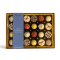 Chocolat in Kirkby Lonsdale gift box of 24 assorted white chocolate truffles with decorative patterns and textures.