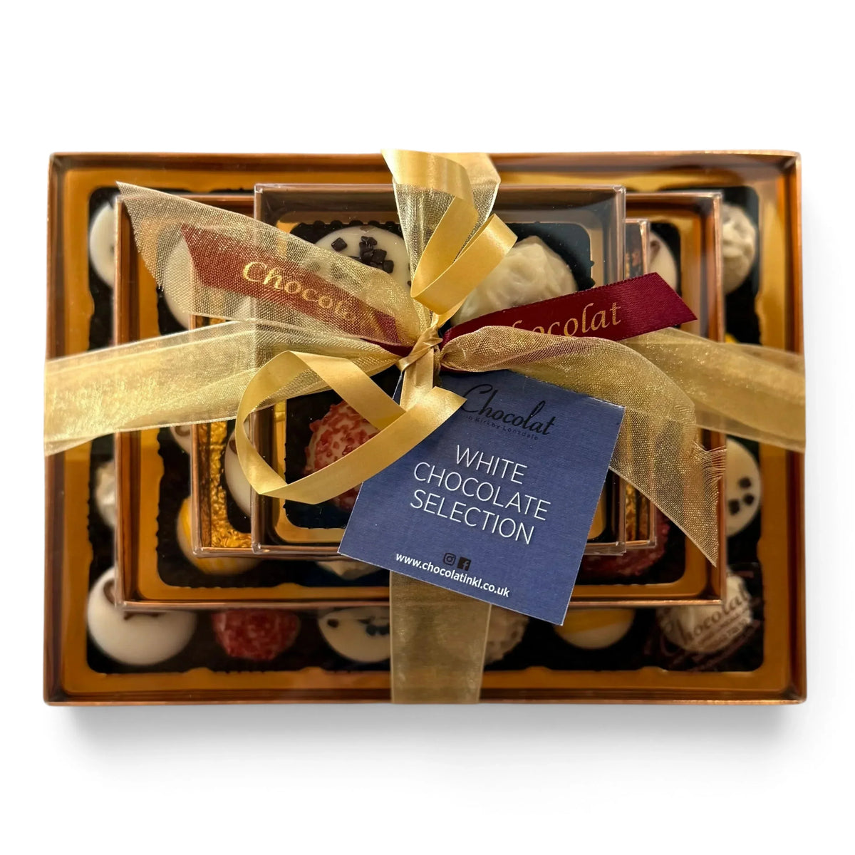 Chocolat in Kirkby Lonsdale luxury stack of 46 white chocolates in a gift tower with gold ribbon and branded tag