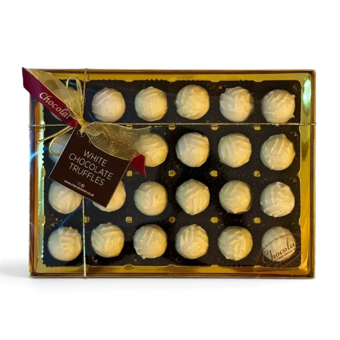 Chocolat in Kirkby Lonsdale gift box of 24 creamy white chocolate truffles with gold ribbon and branded tag